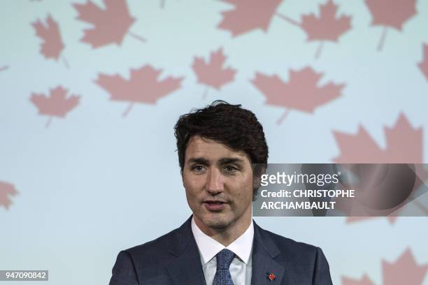 Canadian Prime Minister Justin Trudeau delivers a speech during the inauguration of the new Canadian Embassy in Paris, on April 16 as part of his...