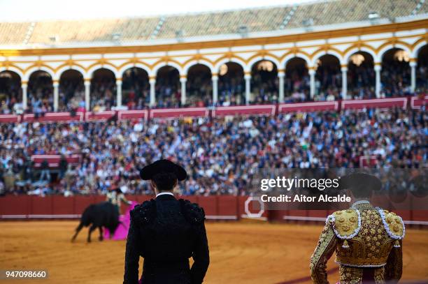 Spanish Bullfighter Julian Lopez Escobar "El Juli" performs while Alejandro Talavante and Enrique Ponce looks his perfomance during the Feria de...