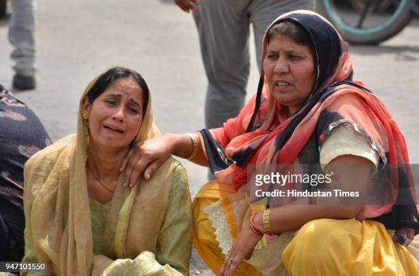 Photo of family members of gangster Bhupesh alias Bhupi Rana who was shot dead by unidentified assailants on Monday morning at Barwala on April 16,...