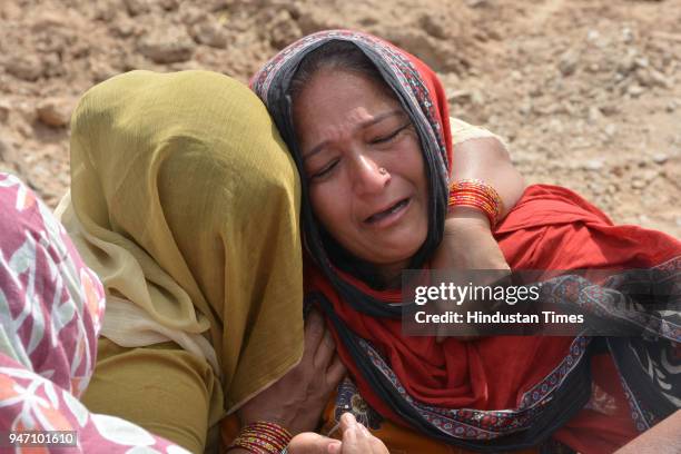 Photo of mother of gangster Bhupesh alias Bhupi Rana who was shot dead by unidentified assailants on Monday morning at Barwala on April 16, 2018 in...