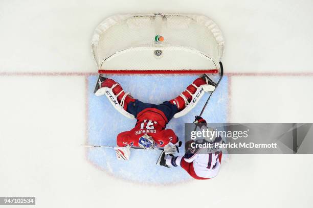 Cam Atkinson of the Columbus Blue Jackets scores a first period goal against Philipp Grubauer of the Washington Capitals in Game Two of the Eastern...