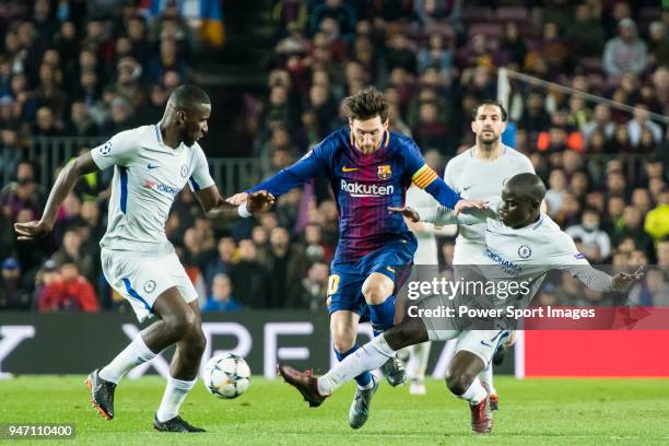 Lionel Andres Messi of FC Barcelona competes for the ball with N'Golo Kante and Antonio Rudiger of Chelsea FC during the UEFA Champions League...