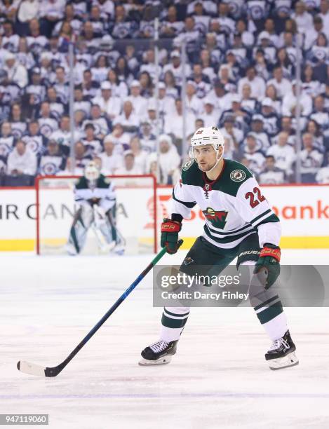 Nino Niederreiter of the Minnesota Wild keeps an eye on the play during third period action against the Winnipeg Jets in Game One of the Western...