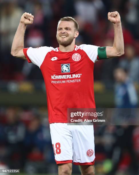 Daniel Brosinski of Mainz celebrates after the Bundesliga match between 1. FSV Mainz 05 and Sport-Club Freiburg at Opel Arena on April 16, 2018 in...