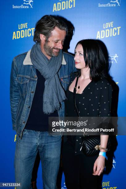 Actors Benjamin Rolland and Neia Aliabyeva attend the "Love Addict" : Premiere at Cinema Gaumont Marignan on April 16, 2018 in Paris, France.