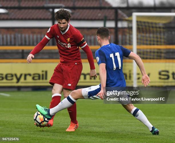 Corey Whelan of Liverpool and Nathan Broadhead of Everton in action during the Everton v Liverpool PL2 game on April 16, 2018 in Southport, England.