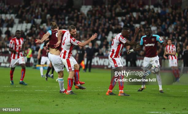 Andy Carroll of West Ham United scores his sides first goal during the Premier League match between West Ham United and Stoke City at London Stadium...