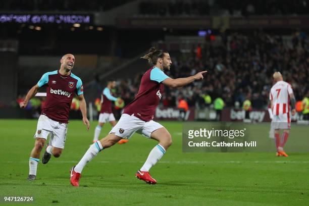 Andy Carroll of West Ham United celebrates with teammate Pablo Zabaleta of West Ham United after scoring his sides first goal during the Premier...