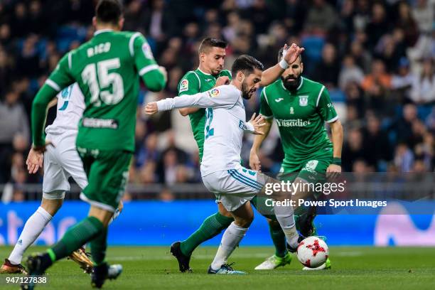 Isco Alarcon of Real Madrid fights for the ball with Gabriel Appelt Pires of CD Leganes action during La Copa del Rey 2017-18 match between Real...