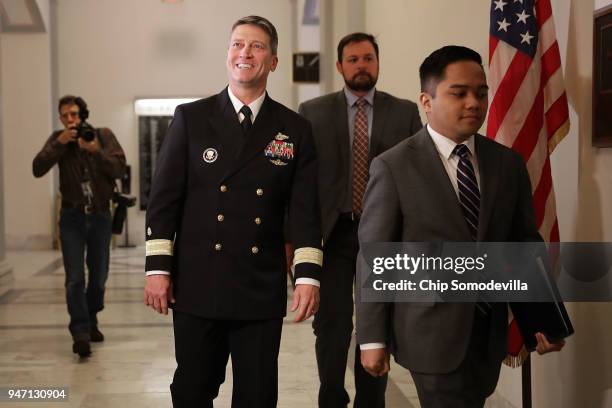 Physician to the President U.S. Navy Rear Admiral Ronny Jackson waves to journalists as he heads into a meeting with Senate Veterans Affairs...