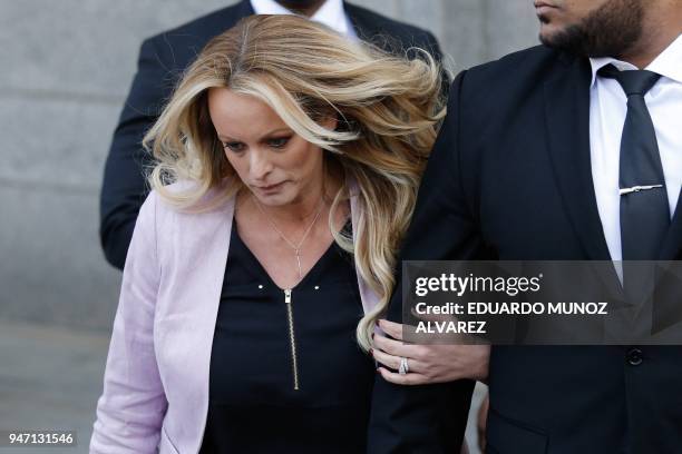 Adult-film actress Stephanie Clifford, also known as Stormy Daniels exits the US Federal Court on April 16 in Lower Manhattan, New York. President...