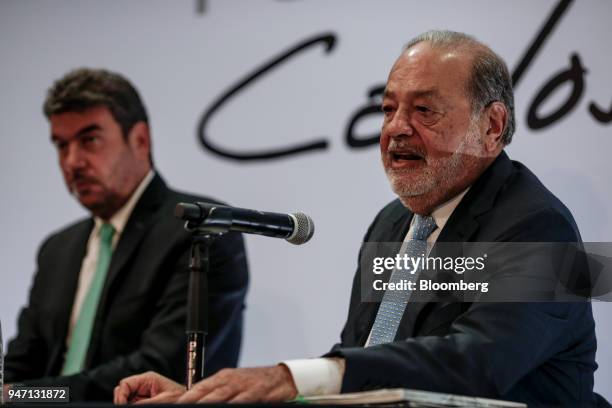 Carlos Slim, chairman emeritus of America Movil SAB, right, speaks during a press conference in Mexico City, Mexico, on Monday, April 16, 2018. Slim...