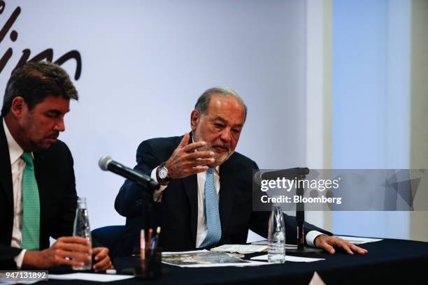 Carlos Slim, chairman emeritus of America Movil SAB, right, speaks during a press conference in Mexico City, Mexico, on Monday, April 16, 2018. Slim...
