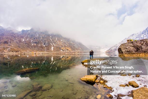 young couple at the adventurous place - indian honeymoon couples stock pictures, royalty-free photos & images