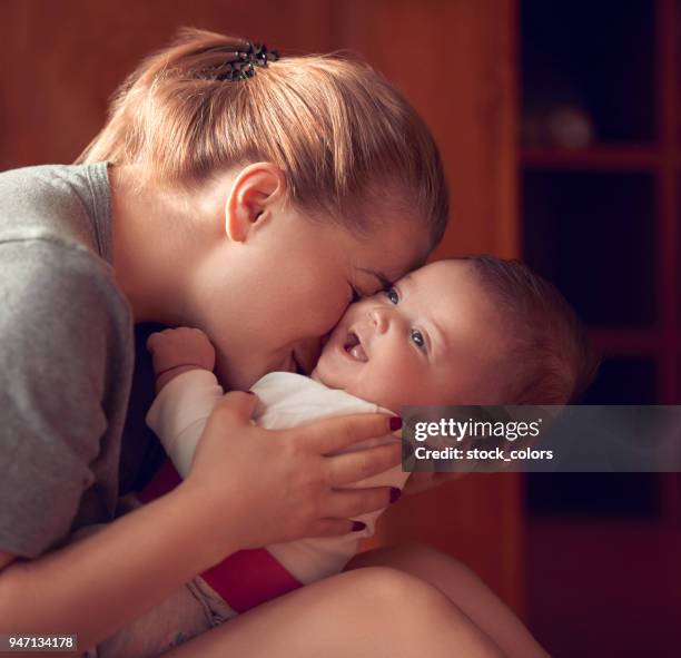 kissing my baby girl - tickling stock pictures, royalty-free photos & images