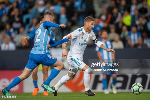 Sergio Ramos and Lestienne battle for the ball during the match between Malaga CF against Real Madrid, week 32 of La Liga 2017/18 in Rosaleda...