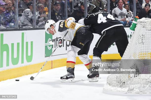 Ryan Carpenter of the Vegas Golden Knights battles for the puck against Nate Thompson of the Los Angeles Kings in Game Three of the Western...