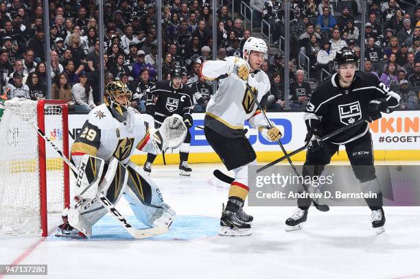 Marc-Andre Fleury of the Vegas Golden Knights defends the net against Dustin Brown of the Los Angeles Kings in Game Three of the Western Conference...