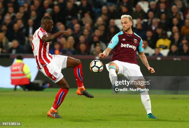 Stoke City's Kurt Zouma and West Ham United's Marko Arnautovic during English Premier League match between West Ham United and Stoke City at London...