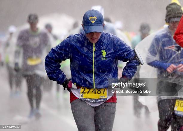 Runners climb Heartbreak Hill during the Boston Marathon in Newton, Mass., April 16, 2018.