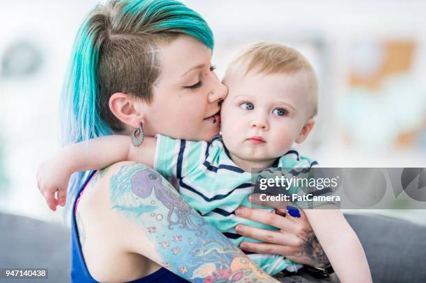 son and his mother - little punk stock pictures, royalty-free photos & images