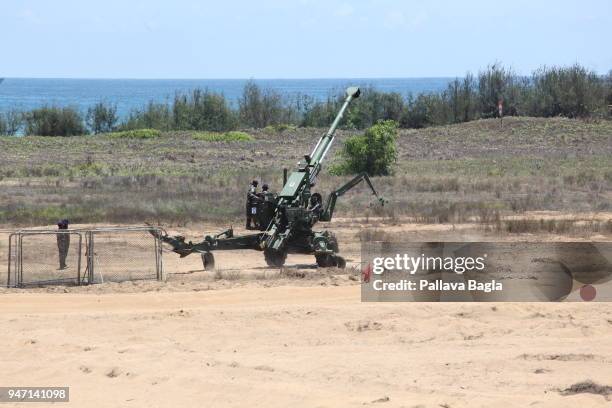 An Indian made 155 mm artillery gun in action it can shoot and scoot on its own power. Indian armed forces air force, army and navy gave a joint live...