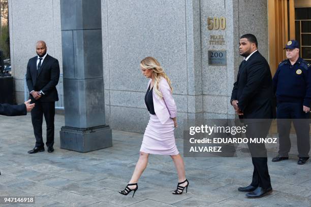 Adult-film actress Stephanie Clifford, also known as Stormy Daniels exits the US Federal Court on April 16 in Lower Manhattan, New York. President...