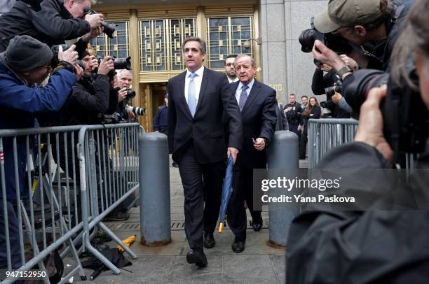 Michael Cohen, longtime personal lawyer and confidante for President Donald Trump, leaves Federal Court after his hearing at the United States...