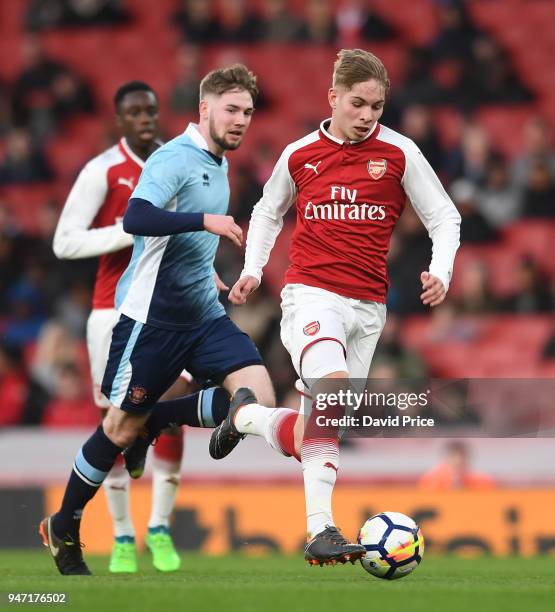 Emile Smith Rowe of Arsenal takes on Dylan Sumner of Blackpool resulting in a penalty during the match between Arsenal and Blackpool at Emirates...