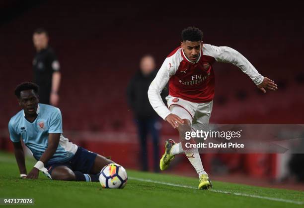 Dominic Thompson of Arsenal takes on Nana Adarkwa of Blackpool during the match between Arsenal and Blackpool at Emirates Stadium on April 16, 2018...