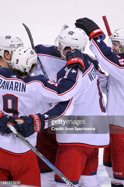 Columbus Blue Jackets defenseman Zach Werenski is congratulated after his second period goal against the Washington Capitals on April 15 at the...