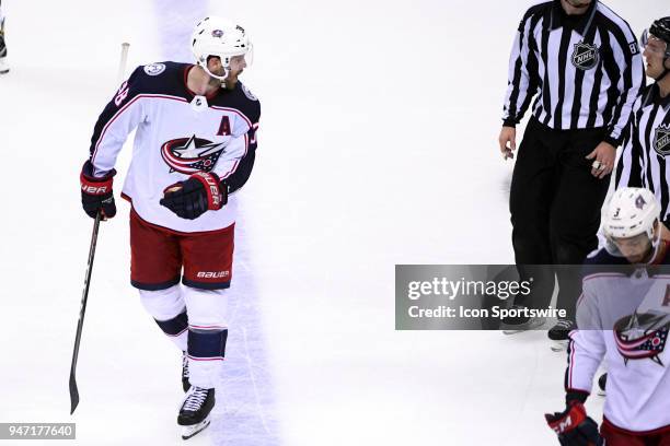 Columbus Blue Jackets center Boone Jenner yells back at the referee after being called for a third period penalty against the Washington Capitals on...