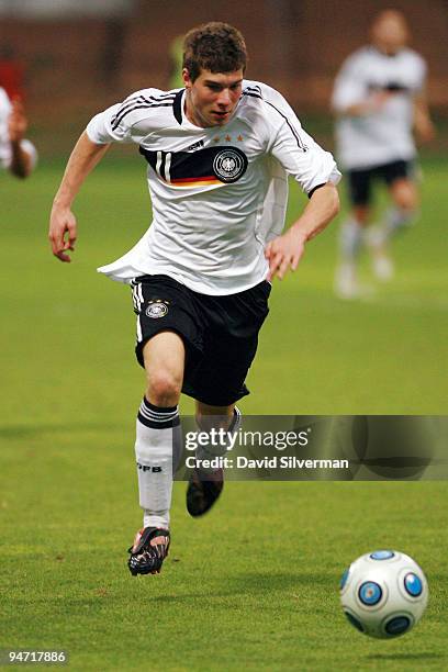 Denis Russ of Germany runs with the ball against Israel during an international friendly match on December 17, 2009 in Kfar Saba, Israel. Germany...