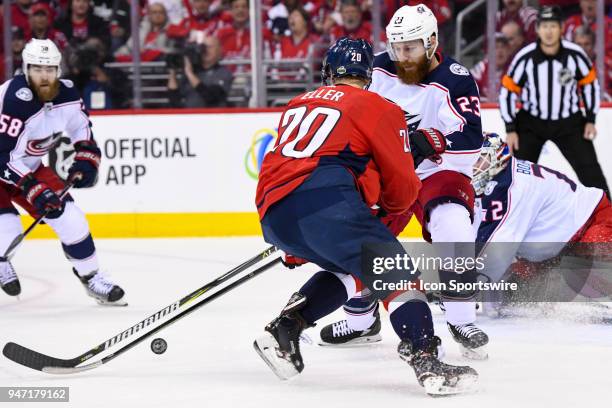 Washington Capitals center Lars Eller has his first period shot stopped by Columbus Blue Jackets defenseman Ian Cole on April 15 at the Capital One...