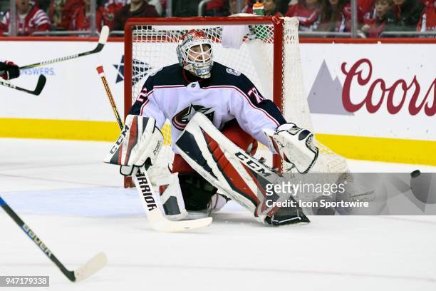 Columbus Blue Jackets goaltender Sergei Bobrovsky makes a first period save against the Washington Capitals on April 15 at the Capital One Arena in...