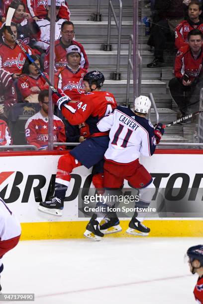 Washington Capitals defenseman Brooks Orpik is hit by Columbus Blue Jackets left wing Matt Calvert in the second period on April 15 at the Capital...