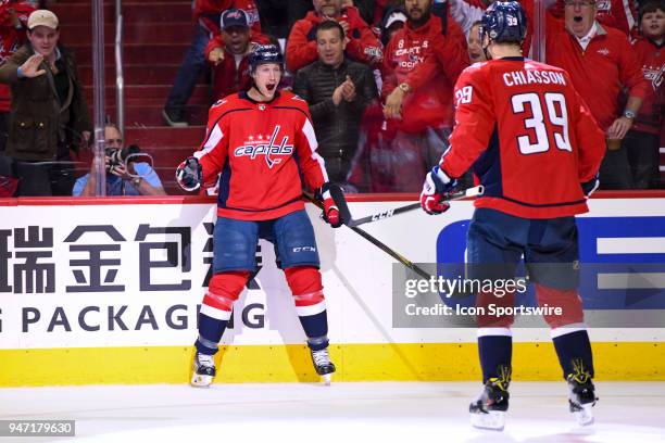 Washington Capitals center Jay Beagle reacts as right wing Alex Chiasson skates in after scoring a first period goal against the Columbus Blue...