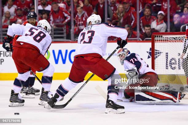 Columbus Blue Jackets goaltender Sergei Bobrovsky makes a first period save on a shot by the Washington Capitals on April 15 at the Capital One Arena...