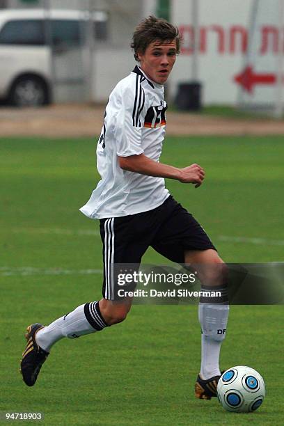 Nils Rosseler of Germany runs with the ball against Israel during an international friendly match on December 17, 2009 in Kfar Saba, Israel. Germany...