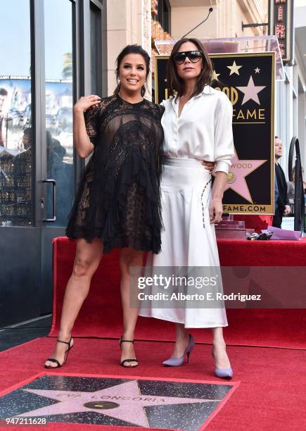 Eva Longoria and Victoria Beckham attend a ceremony honoring Eva Longoria with the 2,634th Star on the Hollywood Walk of Fame on April 16, 2018 in...