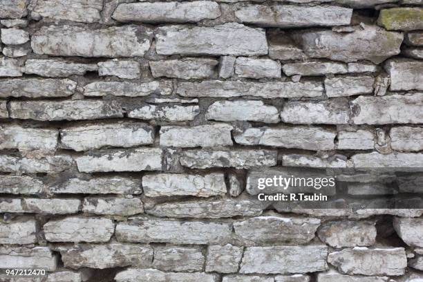 old stone wall background texture - masonry wall stock pictures, royalty-free photos & images