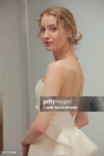 Kyah LaBancz models the Angel Sanchez Bridal 2019 Preview of his collection during New York Fashion Week: Bridal April 2018 on April 16, 2018 in New...