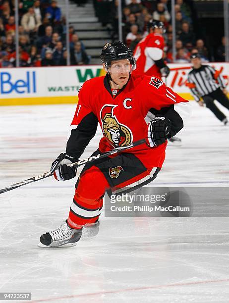 Daniel Alfredsson of the Ottawa Senators turns back into the offensive zone during a game against the Buffalo Sabres at Scotiabank Place on December...