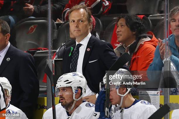 Head Coach Jon Cooper of the Tampa Bay Lightning looks on from the bench in Game Three of the Eastern Conference First Round against the New Jersy...