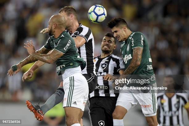 Joel Carli and Brenner of Botafogo struggles for the ball with Felipe Melo and Bruno Henrique of Palmeiras during the match between Botafogo and...