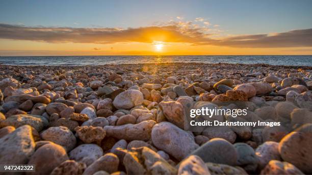 sunset rocks on the beach of wallaroo - wallaroo stock pictures, royalty-free photos & images