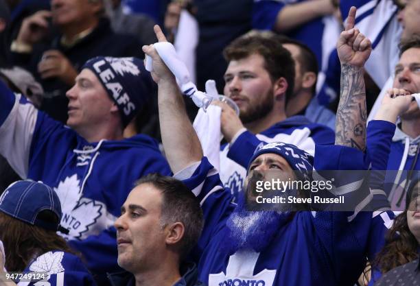 Fans cheer as the Toronto Maple Leafs beat the Boston Bruins 4-2 in game three of their first round NHL Stanley Cup playoff series at the Air Canada...