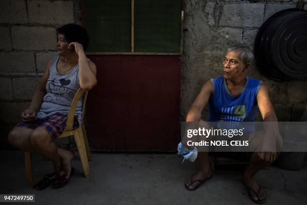 This photo taken on March 2, 2018 shows Melinda Colite and Alejandro Colite, the grandparents of Zandro Colite, who Melinda says died after getting...
