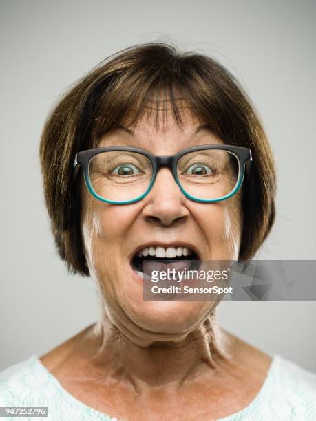 real shouting senior woman portrait - ugly woman stock pictures, royalty-free photos & images