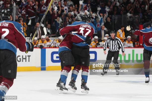 Gabriel Bourque of the Colorado Avalanche celebrates a goal against the Nashville Predators with teammate J.T. Compher in Game Three of the Western...